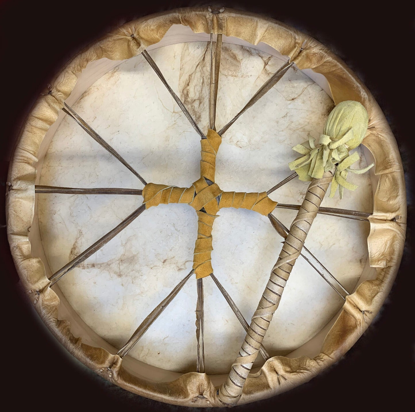 Make Your Own 18" Hand-drum with Katherine Skaggs- example of the back of the drum made in ancient style with a drum beater