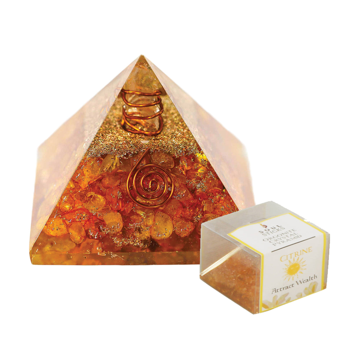 Organite Pyramid- with Citrine crystal, and copper spiral design and a small box labeled 'Crystal Magic' on a white background