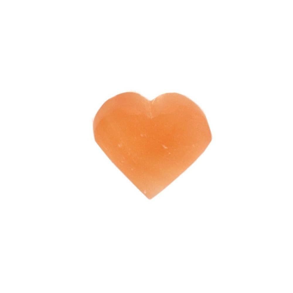 A small, smooth, peach selenite heart-shaped orange stone cabochon on a solid white background.