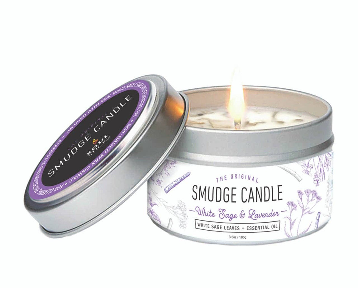 White Sage & Lavender smudge candle in a tin with a purple lid on a white background at katherineskaggs.com