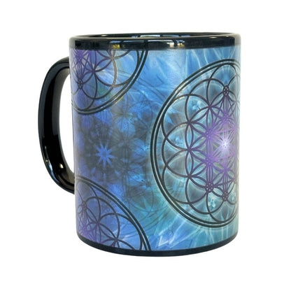 Flower of Light color changing art mug side view after hot beverage poured in