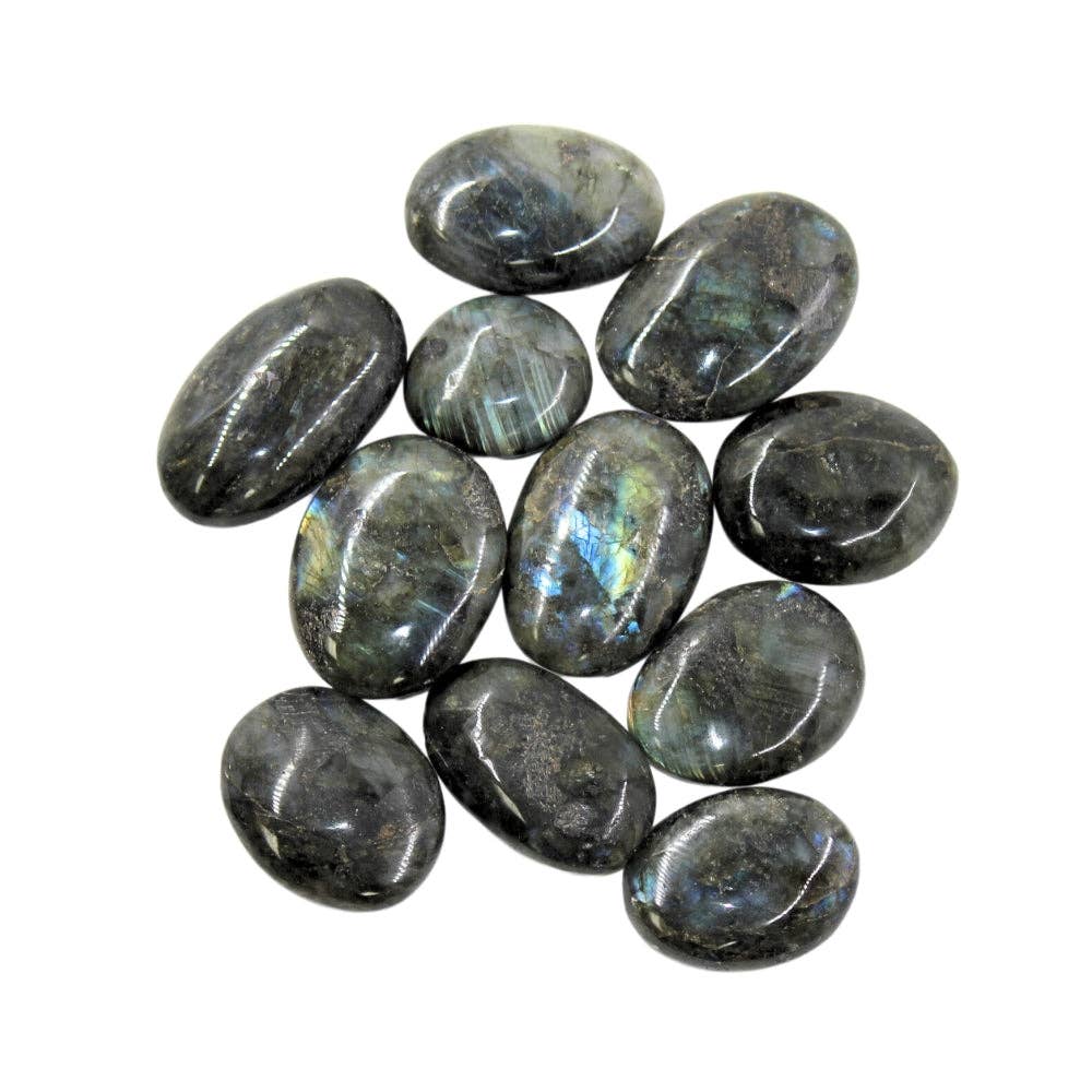 Collection of polished labradorite stones on a white background