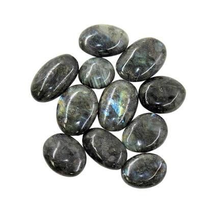 Collection of polished labradorite stones on a white background